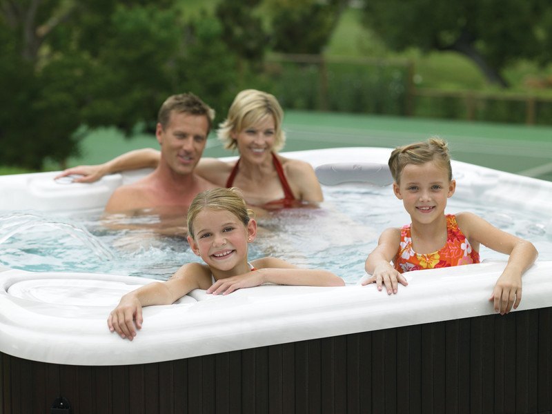 Family vacation memories in the hot tub.