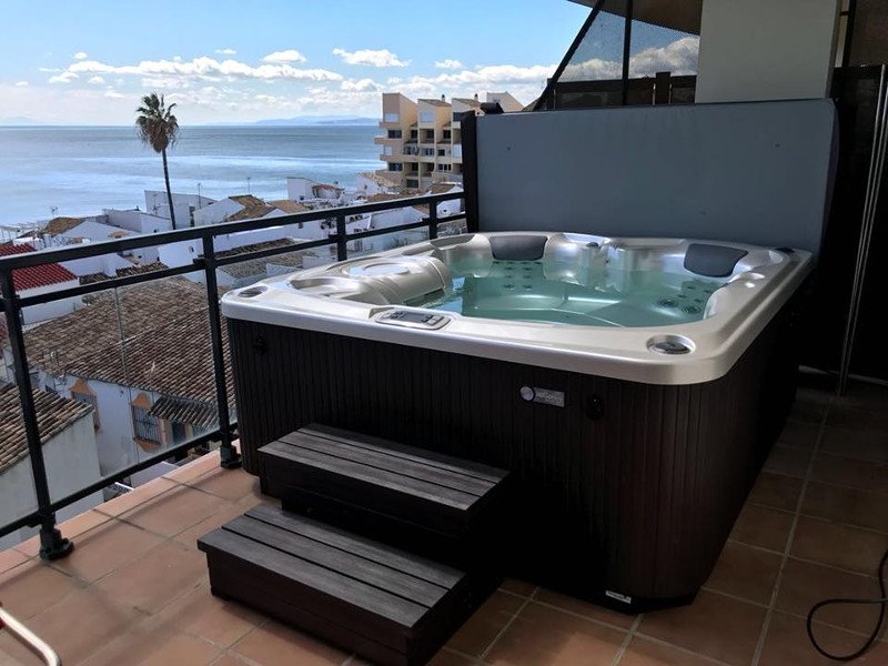 Backyard Hot Tubs That Inspire Us Hot Spring Spas Idle by the seaside in a Hot Spring hot tub - Backyard Hot Tubs That Inspire Us Hot Spring Spas